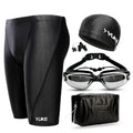 Men's five-piece swimming set showing black trunks, goggles, cap, ear plugs, nose clip, and carry bag.