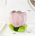 Ceramic flower pen holder storage box with floral pattern on desktop