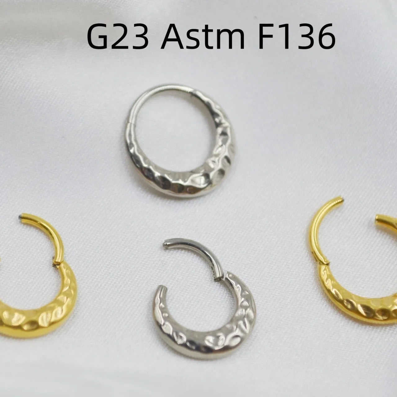 Titanium alloy concave-convex nose ring in gold or silver colour with ASTM F136 purity and 1.2mm diameter