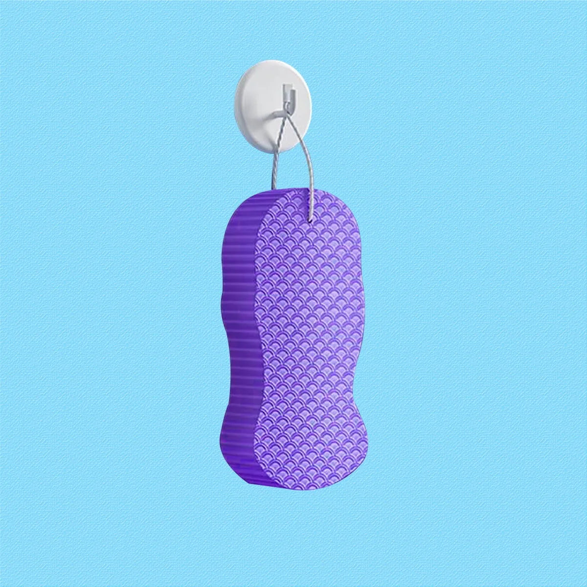 3D fish scale pattern bath sponge in light blue colour showing textured exfoliating surface