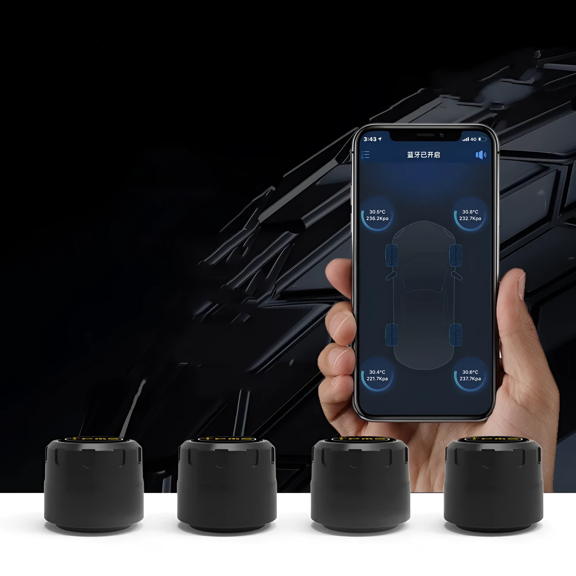 Black Bluetooth tyre pressure monitoring system kit with four external sensors, a wrench, and anti-theft screws on a white background