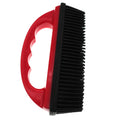 Red silicone pet hair removal brush with massage bristles for grooming and carpet cleaning