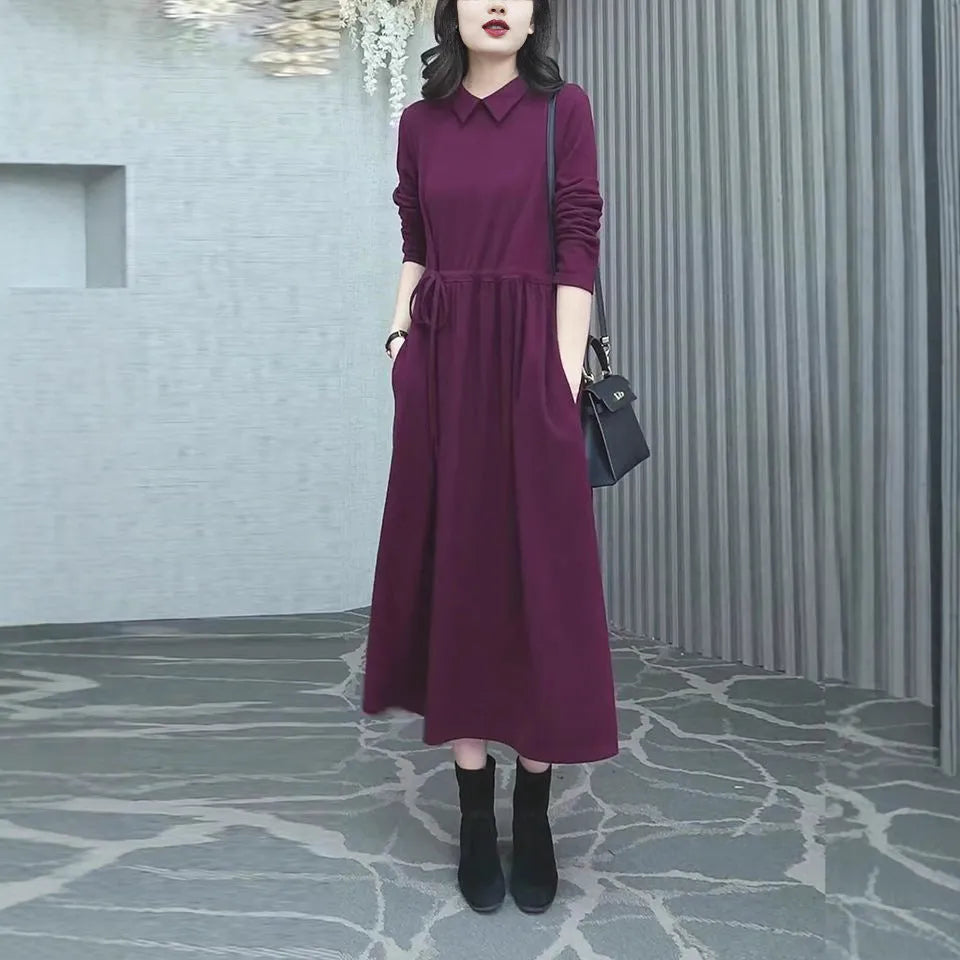 Purplish red plus size dress with extra long sleeves and long skirt for winter wear