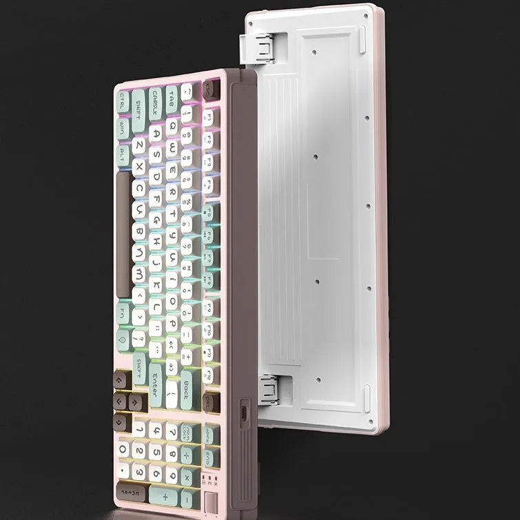 Three-colour luminous mechanical-feel USB keyboard in desktop setup showing backlighting
