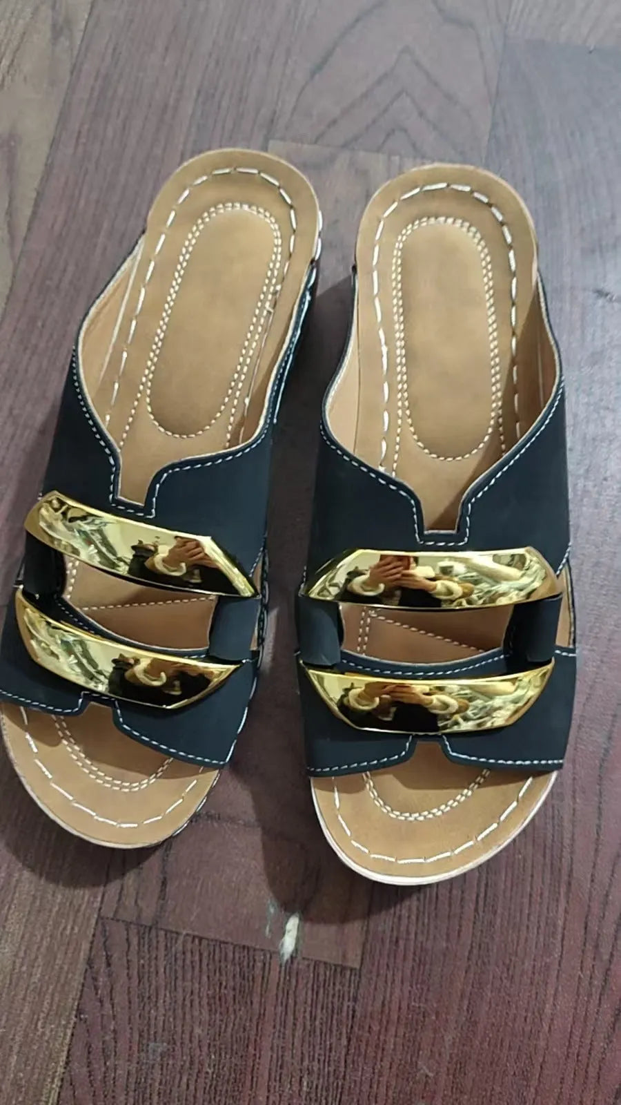 Roman style platform flip-flops in black, white, khaki, or sea blue with a rubber sole.