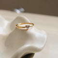 Golden electroplated stainless steel love heart ring showing heart shape design elements