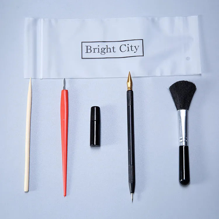 Scraping painting tool set with scratch pens, small scrapers, and white card paper for texture art
