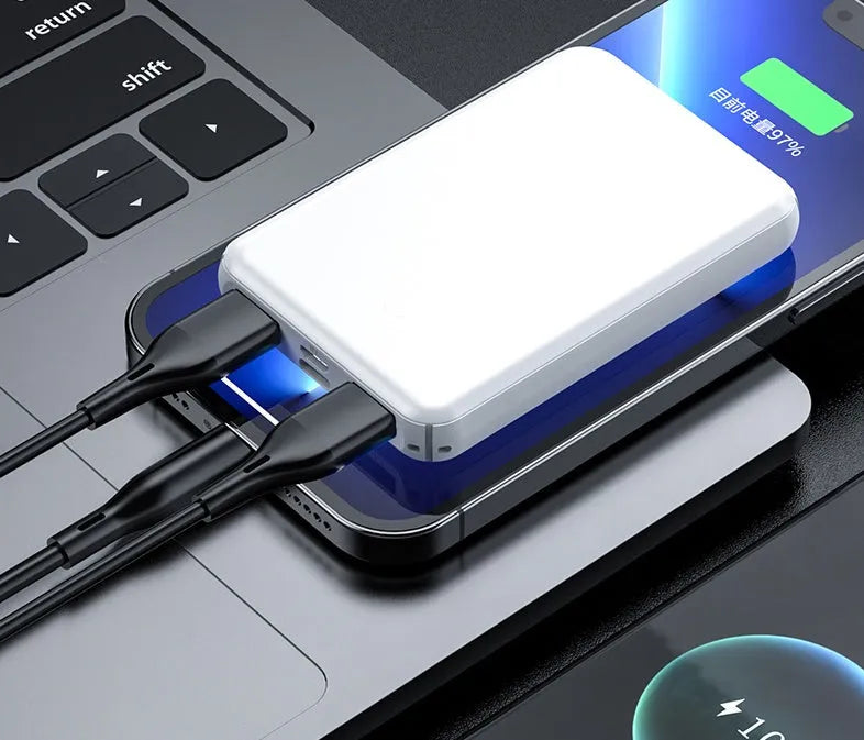 Black universal USB power bank for electric heating vests showing compact size.