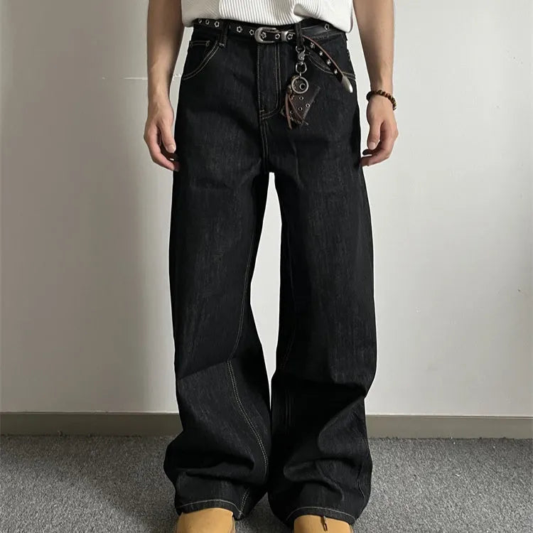Black loose fit wide-leg denim jeans with a straight leg and mid waist on a hanger.