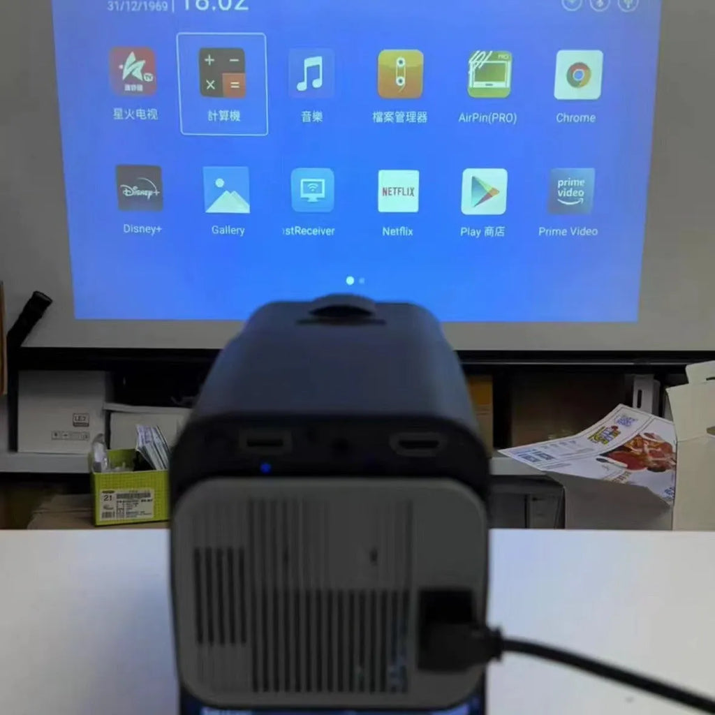 Wireless HD game machine projector for home use with gaming consoles.