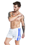 Men's blue lace-up sports shorts with padding and slim fit styling for athletic activities