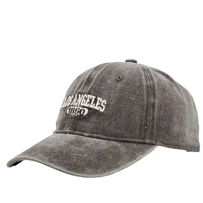 Retro personalised embroidered peaked cap in acrylic fabric with adjustable fit and distressed lettering