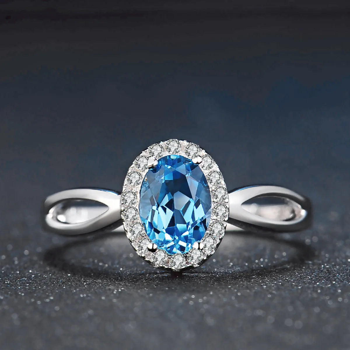 925 sterling silver jewellery set with blue topaz gems including earrings, ring, necklace and pendant