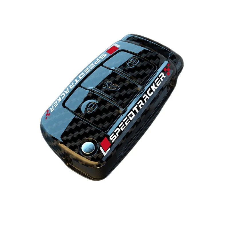 Carbon fibre style car key cover with mirror in feilin material, shown in carbon colour.