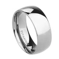 Polished silver titanium steel ring on a finger, showing a minimalist band design.