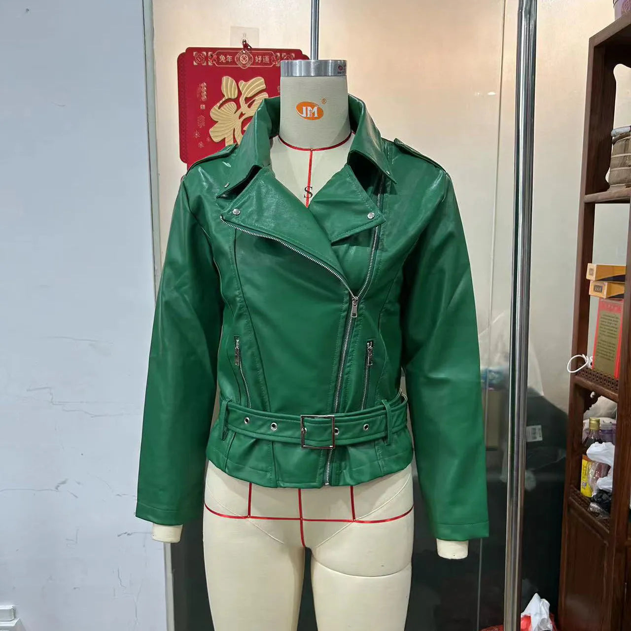 Punk style leather jacket with locomotive lapel and Peter Pan collar in polyester construction