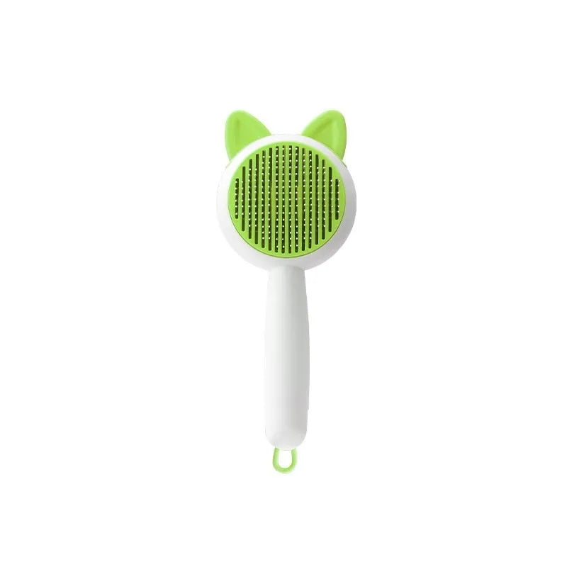 Self-cleaning cat grooming comb with stainless steel bristles in greenish white and orange white colour options