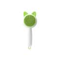 Self-cleaning cat grooming comb with stainless steel bristles in greenish white and orange white colour options