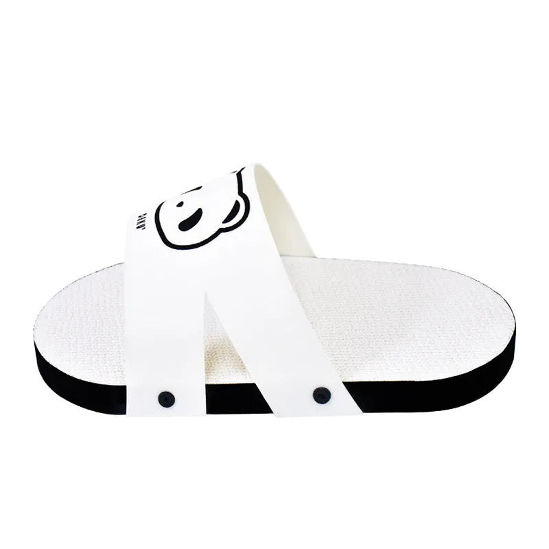 White slipper-style corrugated paper cat scratch board on flat surface