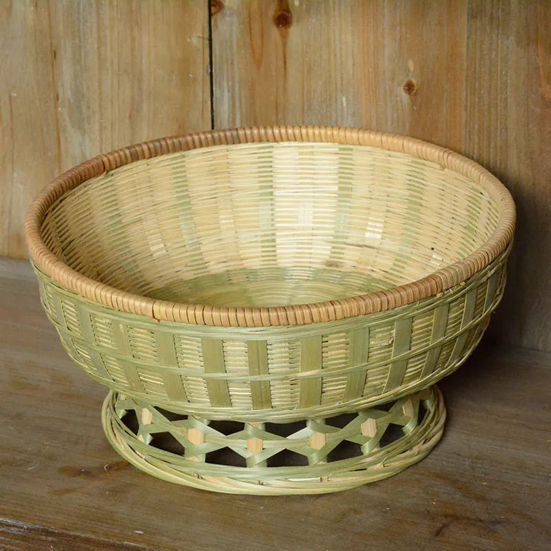 Handmade natural bamboo storage basket in woven construction showing three size options