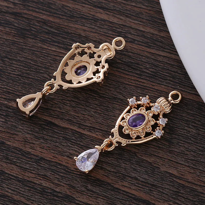 Small water drop-shaped pendant with micro inlaid zircon detail and crown hollow design