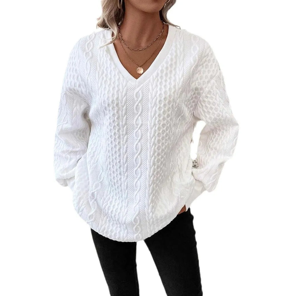 Milky white loose fit long sleeve t-shirt with a 3D pattern on a hanger