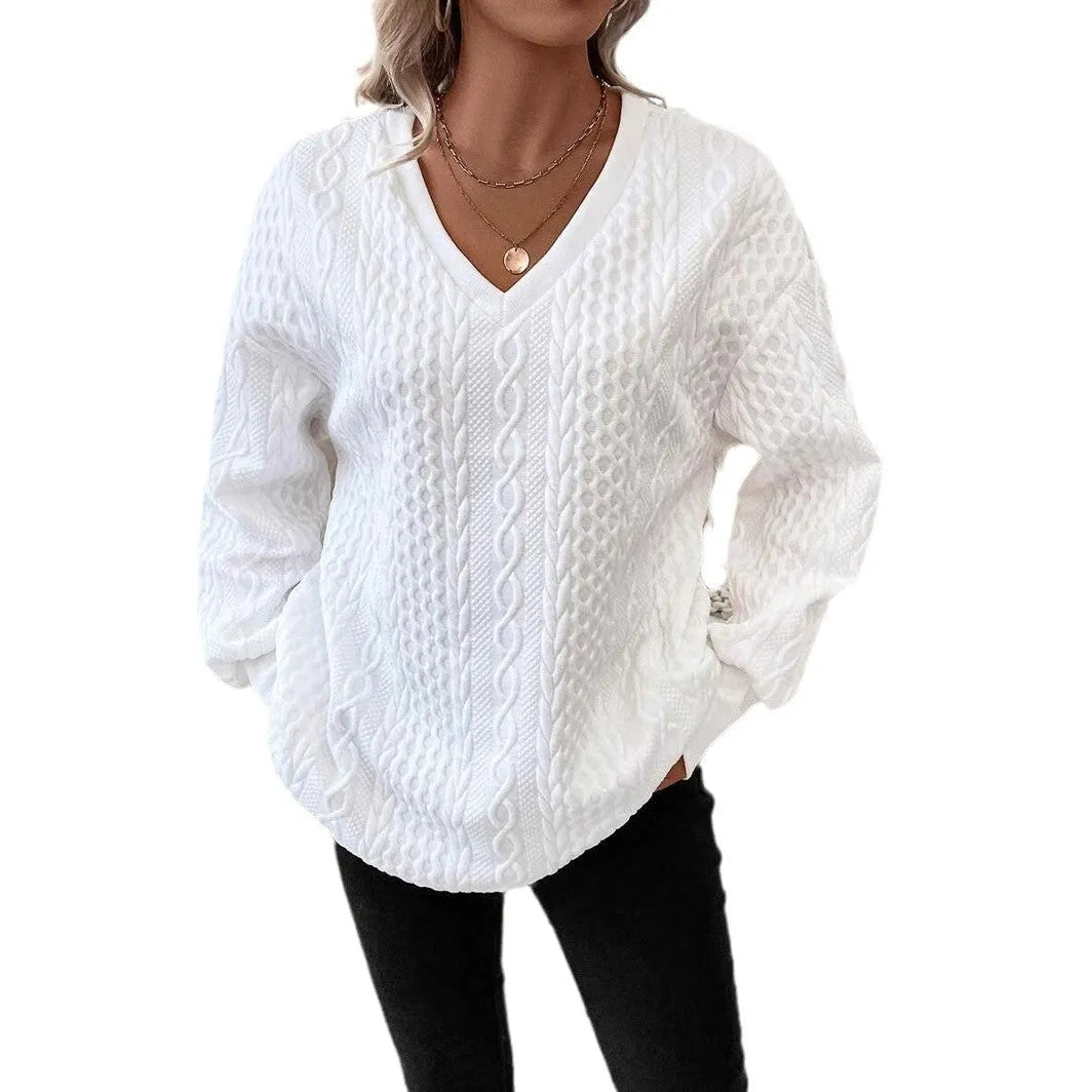 Milky white loose fit long sleeve t-shirt with a 3D pattern on a hanger
