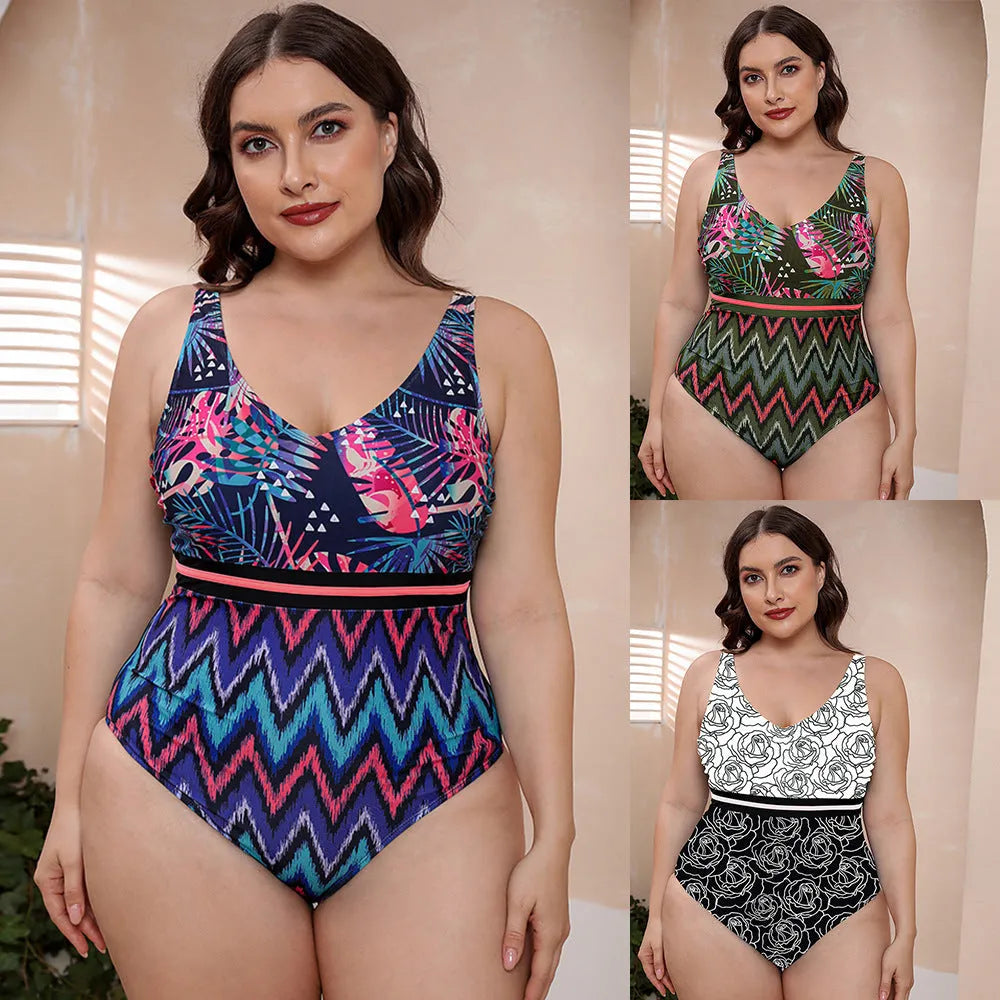 Blue and white printed one-piece swimsuit for women with spaghetti straps, shown on a mannequin.