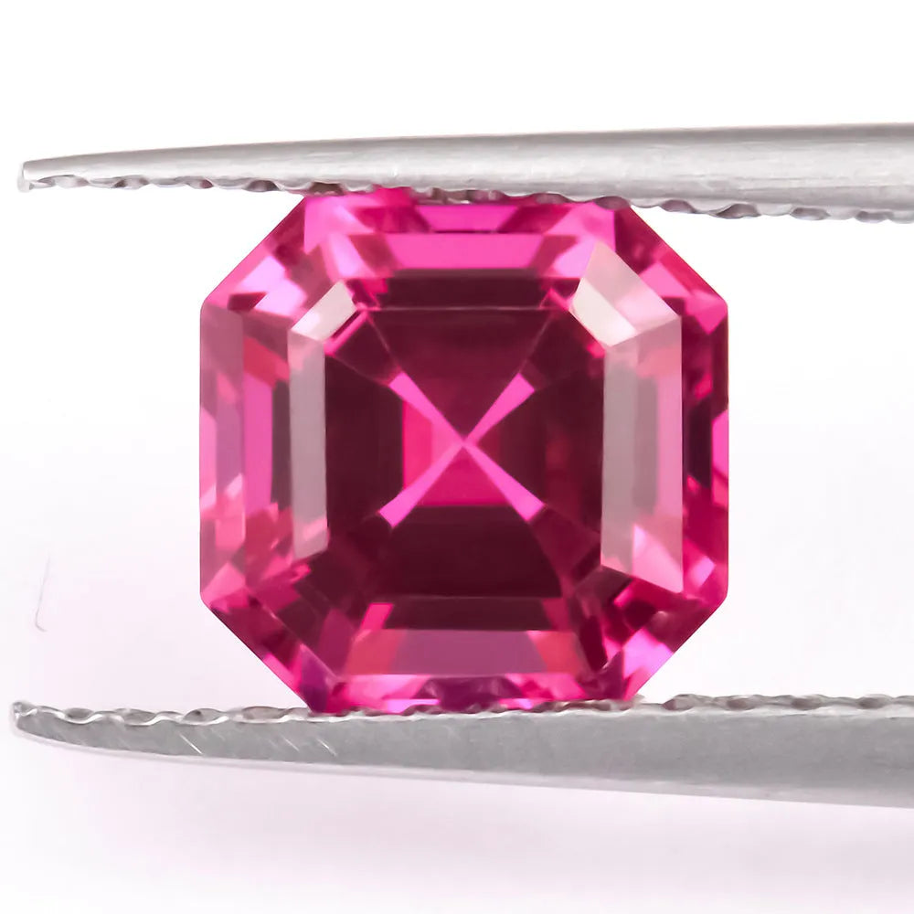 Artificial pigeon blood red ruby gemstone in various cuts: egg, round, princess, water drop, grandmother, and Asche.
