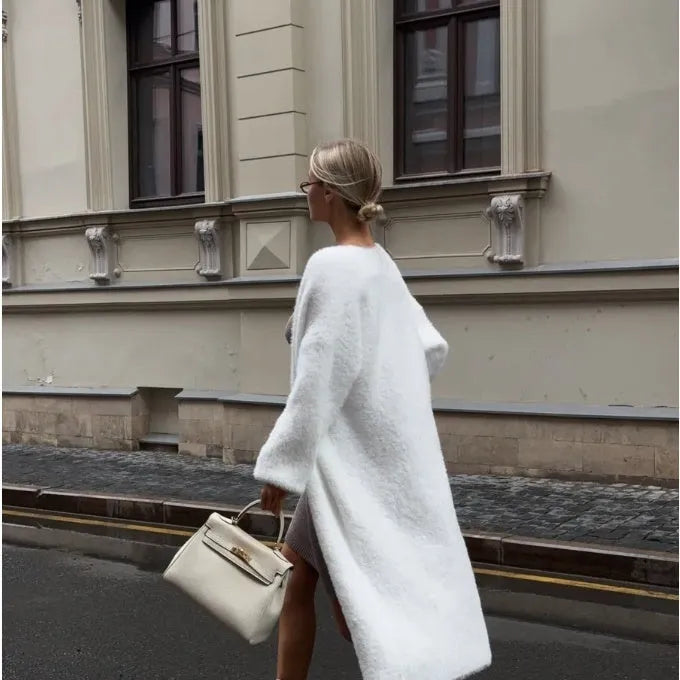 White thick knit polyester cardigan jacket with long sleeves and loose fit
