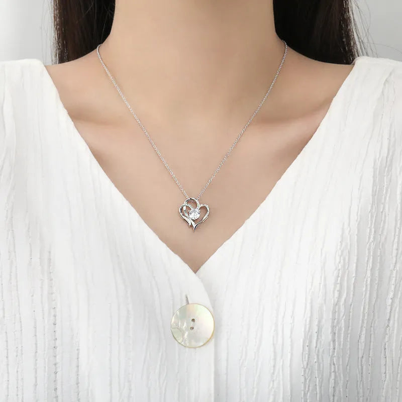 Women's heart-shaped 925 silver necklace shown in rose gold, white gold, and yellow gold plating options.