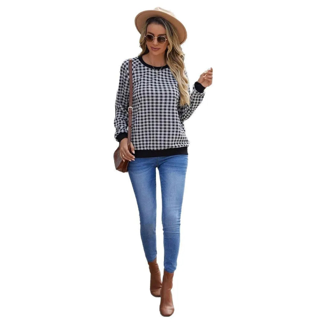 Black long sleeve pullover sweater with a Japanese sweet plaid striped pattern.