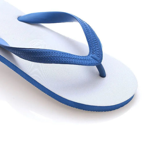 Rubber beach flip-flops with fish label design in green, red, blue, and black colour options