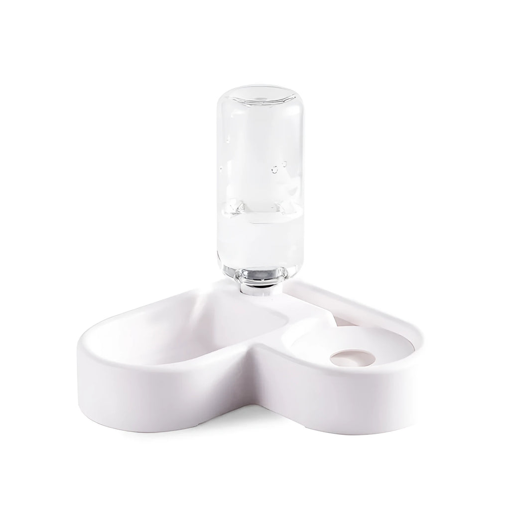 White automatic pet water fountain with stainless steel top on a floor.