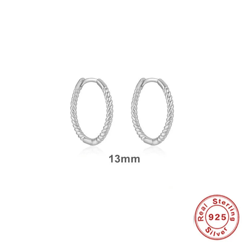 Sterling silver twisted hoop earrings with geometric round shape in gold electroplated finish