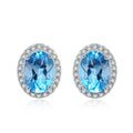 925 sterling silver jewellery set with blue topaz gems including earrings, ring, necklace and pendant