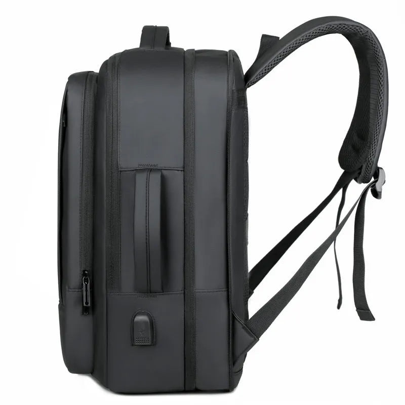 Large capacity waterproof backpack in black or grey Oxford cloth with curved shoulder strap and hand-carry handle