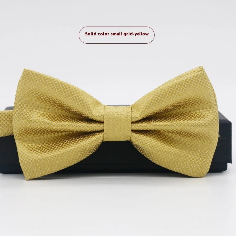 Men's flat head solid colour bow tie in polyester, showing 12cm by 6cm size on a background.