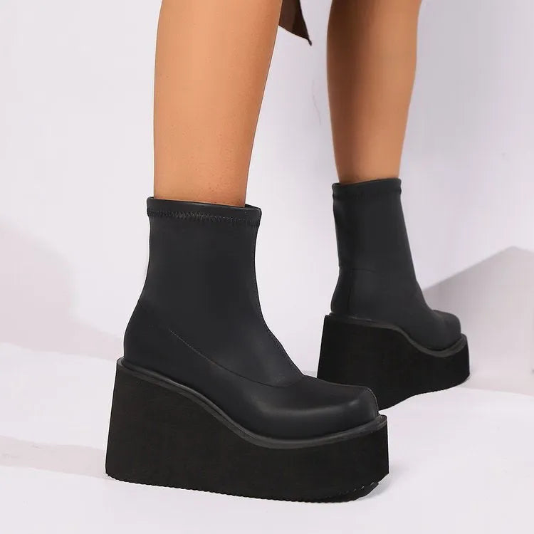 Plus size women's black wedge heel boots with waterproof platform and round toe design