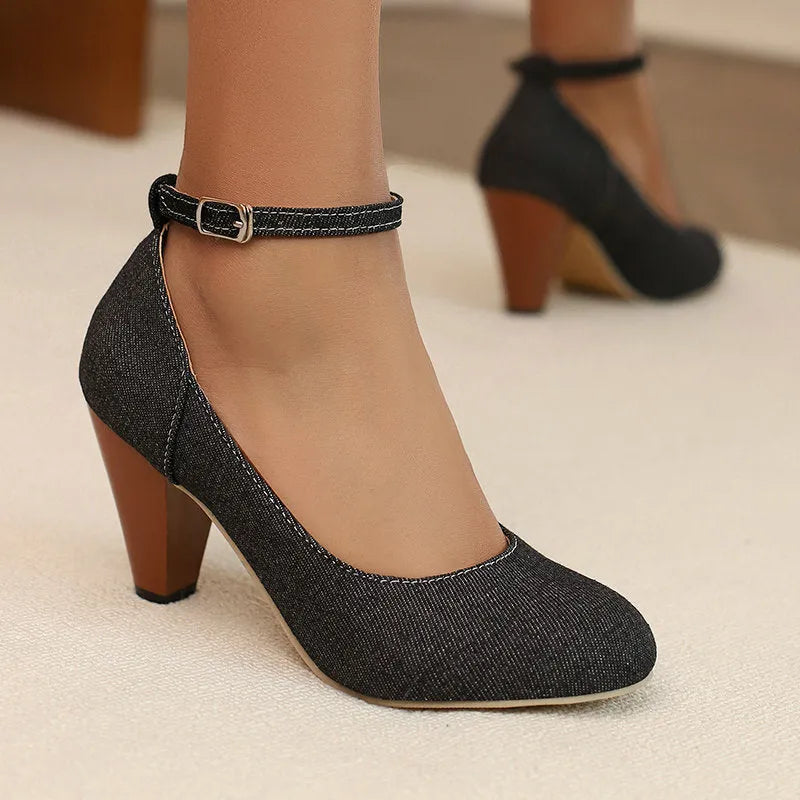 Blue denim women's high heel shoes with a buckle strap and thick waterproof platform sole.