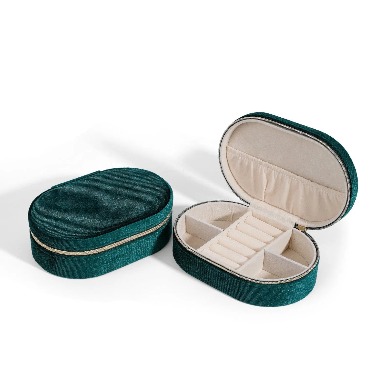Oval velvet jewellery storage box in lake blue colour showing flannel interior and compact 15x10x5cm dimensions