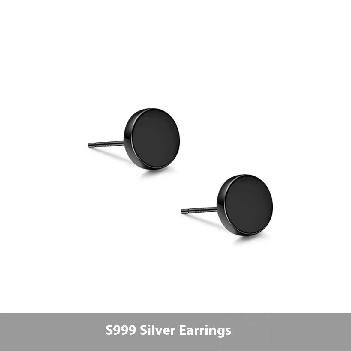 A pair of simple round S999 sterling silver flat ear bone studs on a plain background.