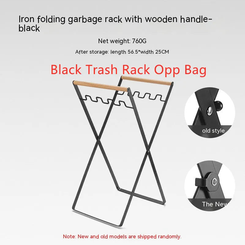 Black folding iron outdoor trash rack with a wooden handle standing upright.