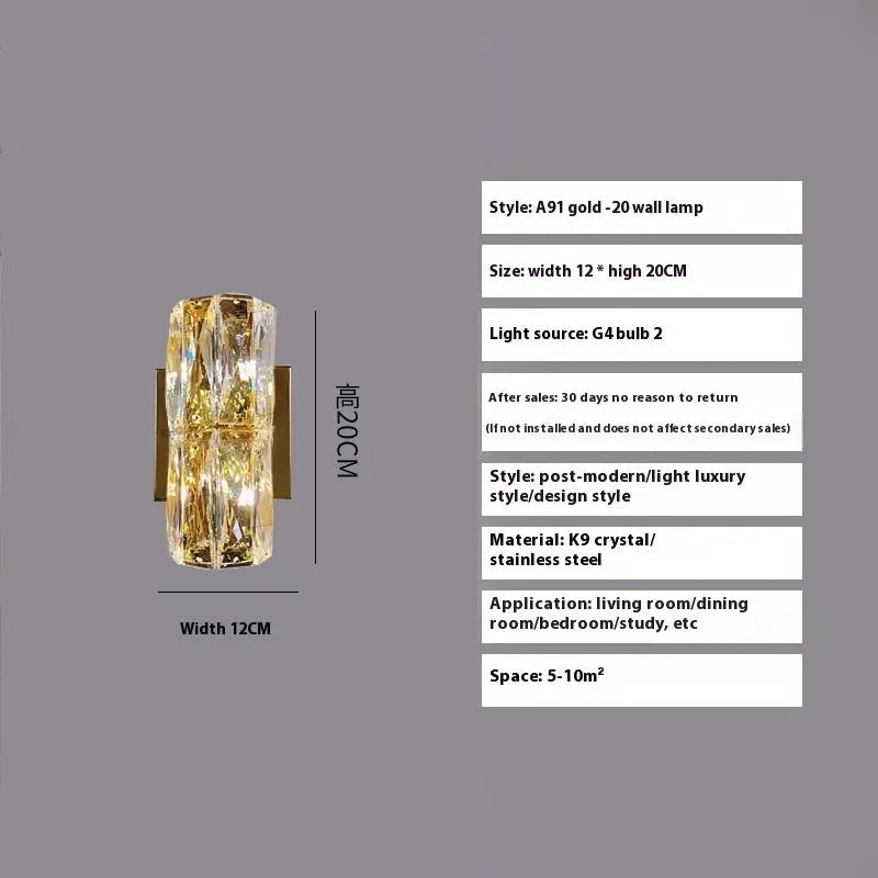 Slim crystal and stainless steel wall lamp with LED light on a wall.