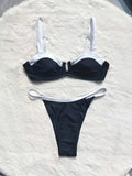 Black low waist women's bikini swimsuit with stitching split detail on briefs.