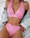 Women's pink halter strap split swimsuit bikini with matching shorts