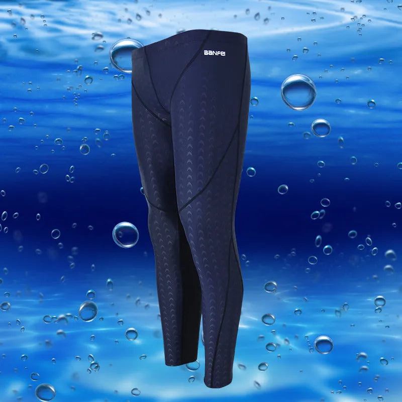 Men's black nylon cropped swimming trunks with a coloured line detail and brief style