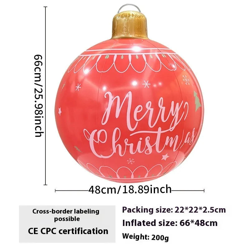 Large inflatable Christmas ball decoration with LED lights in garden setting