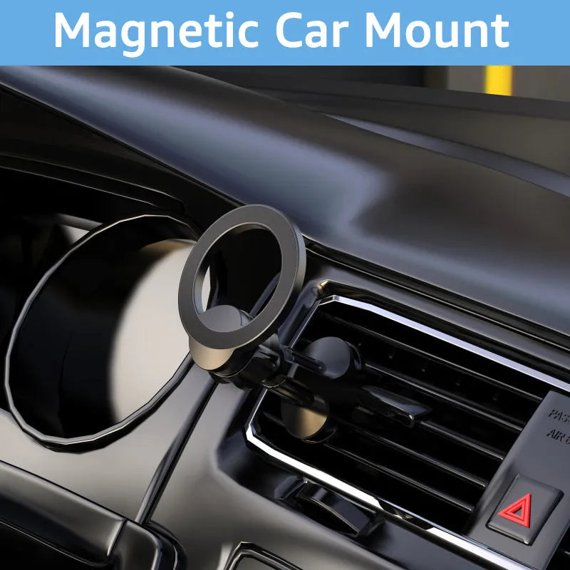 Black magnetic suction car air vent mobile phone holder on a vehicle dashboard.