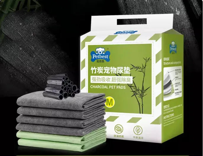 Thickened dog urine training pads showing adhesive backing and bamboo charcoal variety in multiple sizes